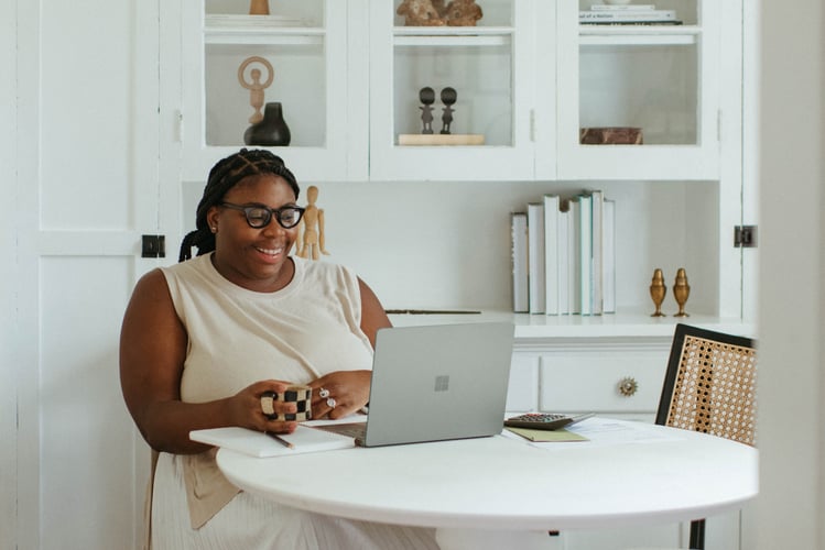 What is Colorado SecureSavings? | Small Business Owner at her Laptop